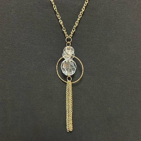 Gold colored necklace with clear faceted plastic bead and four flat round beads - Picture 1 of 4